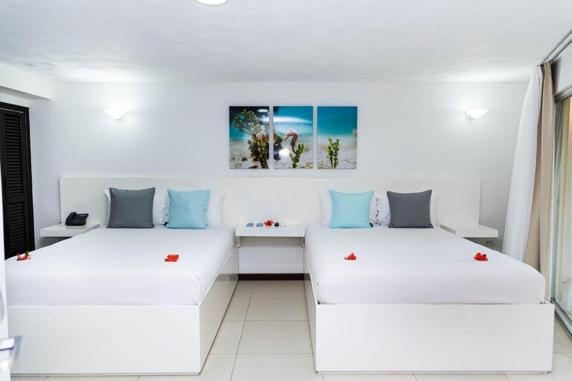 Paradise Beach Hotel & Resort West Bay Camera foto